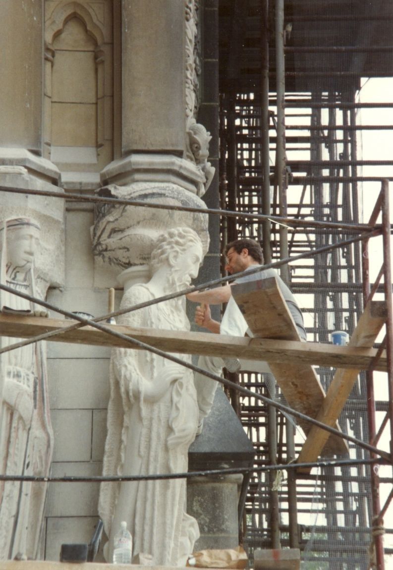 Jean-Claude Marchionni carving a figure for the Portal of Paradise.